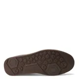 Championes urbanos Caterpillar Pause Retro Canvas, color negro con detalles en gris y suela marrón.