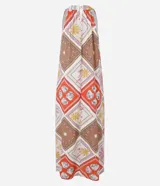 Vestido midi evasê sin mangas, confeccionado en viscolino con cuello halter y estampado tropical con cuadros e ilustraciones. El tejido contiene viscosa certificada.