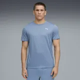 Remera deportiva Puma TAD ESS Poly color celeste con logo blanco estampado en el pecho.
