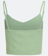 Blusa cropped color verde claro, confeccionada en lino, con escote en V, tirantes finos ajustables y recorte frontal.