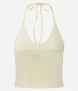 Blusa cropped de frente única color crema, confeccionada en algodón con elastano, con escote en V y lazo en el cuello.