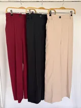 Pantalón sastrero color beige con corte recto y cintura alta, ideal para un look elegante.