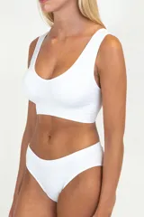 Soutien reductor color beige con breteles anchos y espalda deportiva.