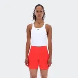 Musculosa deportiva blanca con logo Reebok negro en el pecho.