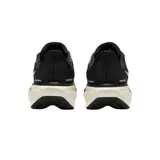 Championes de running Nike Pegasus 41, color negro con detalles en rosa y verde.