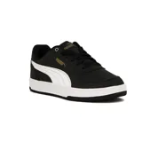 Championes Puma Caven 2.0 de cuero sintético negro con detalles en blanco, suela blanca y logo Puma dorado en el lateral.