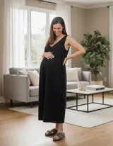 Mono negro de lino elastizado, corte moderno y funcional, con dos cierres laterales invisibles.