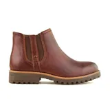 Bota marrón de cuero con elástico lateral, suela de goma y detalle de costuras en la base.