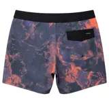 Boardshort de hombre Quiksilver, color azul oscuro con estampado abstracto en tonos rojizos/terracota. Presenta cintura ajustable con cordón negro y un pequeño logo cuadrado de Quiksilver en la parte inferior del muslo izquierdo.