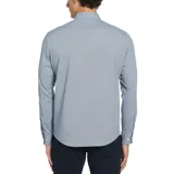 Camisa celeste de manga larga con efecto “crinkle” y tintura en prenda (sobreteñida) para un look gastado y relajado.