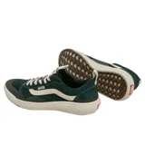 Championes Vans Ultrarange Exo Se, color verde oscuro con detalles en beige y suela texturizada.