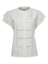 Blusa blanca de lino orgánico y viscosa, con cuello redondo, cierre frontal con botones, mangas cortas con volados y broderie con calados en el frente.