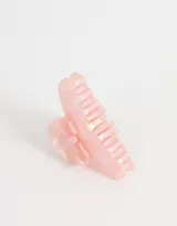 Broche para el pelo color crema con forma de pinza y detalle de moño.