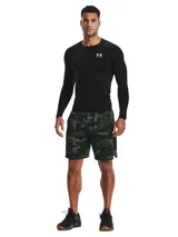 Remera de compresión Under Armour HeatGear de manga larga, color negro con logo blanco en el pecho.