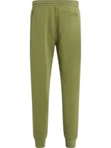 Pantalón de jogging verde oliva de corte recto, con cintura elástica ajustable con cordón, puños elásticos y logo de Calvin Klein Jeans repetido en cinta lateral blanca.
