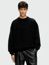 Buzo negro de algodón con logo ovalado Diesel en relieve en el frente.