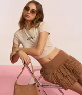 Blusa new t-shirt de manga corta color beige, confeccionada en algodón bci, con cuello redondo y estampado frontal con la frase "Self Love, But I Text My Ex".