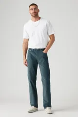 Pantalón de pana azul petróleo de corte recto, con tiro medio y cinco bolsillos.