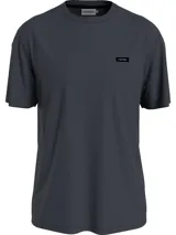 Remera de algodón azul oscuro con cuello redondo, corte regular, mangas cortas y logo de Calvin Klein en el pecho.