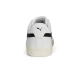 Championes Puma Smash 3.0 de cuero blanco con franja lateral negra y suela color crema.