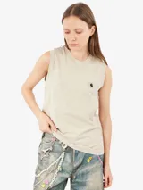 Musculosa beige de algodón orgánico, corte holgado y largo cropped.