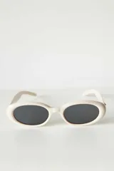 Lentes de sol con marco ovalado de carey y cristales oscuros, con protección UV400.