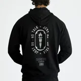 Canguro negro unisex con capucha y cordones ajustables. Estampado en la espalda con un diseño de una antorcha dentro de un óvalo con el texto "JUST DO NO TALK" alrededor.