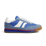 Championes deportivos de estilo retro, color azul y celeste, con detalles en blanco y suela de goma marrón. Presentan tres franjas laterales blancas y una entresuela con capas azul y roja.