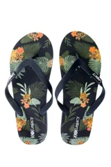 Ojotas negras con estampado de hojas de palmera y flores anaranjadas.