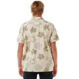 Camisa de manga corta color crema con estampado de flores marrones, cuello americano y cierre frontal con botones negros.