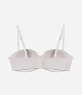 Soutien sin breteles color piel, con copa hueca y tirantes desmontables.