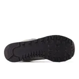 Championes urbanos New Balance modelo 574, color gris con detalles en blanco, confeccionados en gamuza y malla, con logo "N" característico en los laterales y entresuela ENCAP.