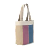 Bolso matero de tela canvas combinada en beige, rosa y azul, con división interna para organizar termo y mate, y asa corta de mano.