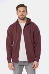 Canguro con cierre y capucha color bordó, confeccionado en felpa de algodón y poliéster.