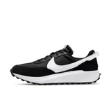 Championes Nike Waffle Debut negros con detalles en blanco y naranja.