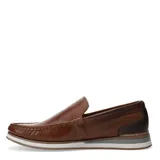 Mocasines de cuero marrón con suela blanca y detalles en gris. Presentan un diseño tipo mocasín con costuras visibles en el empeine y perforaciones laterales.