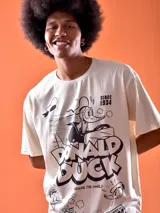 Remera color crema de corte oversized con estampado de Donald Duck.