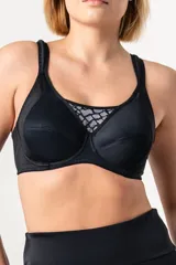 Soutien reductor deportivo negro con aro, confeccionado en jersey y con detalles de puntilla.