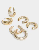 Set de tres pares de aros argolla chunky plateados, de diferentes diseños.