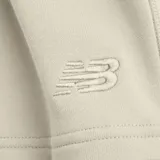 Short color crema con cintura elástica ajustable con cordón y logo tonal bordado en la esquina inferior izquierda. Confeccionado en felpa francesa de algodón.