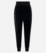 Pantalón deportivo verde oliva confeccionado en microfibra con cintura elástica.