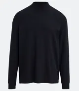 Remera de manga larga confeccionada en tejido de punto de algodón, con cuello tipo mockneck y diseño de hombros caídos.