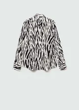 Camisa de manga larga con estampado de cebra en blanco y negro, cuello camisero y cierre frontal con botones.