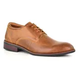 Zapato de vestir acordonado color negro, de cuero liso, con suela de goma y tacón bajo.