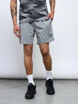 Short deportivo azul de entrenamiento, con pretina en contraste y logo de la marca en la pierna.