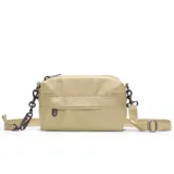 Riñonera Nike Sportswear Futura Luxe Crossbody color beige, con correa ajustable y logo de la marca en el cierre.