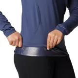 Remera deportiva Columbia Midweight Stretch de manga larga, color negro, con logo estampado en el pecho. Confeccionada en tejido elástico que absorbe la humedad y costuras ergonómicas.
