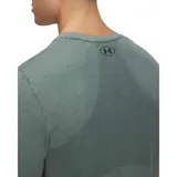 Remera deportiva Under Armour Vanish Seamless de hombre, color negro con logo plateado en el pecho. Confeccionada en tejido transpirable de secado rápido y sin costuras para evitar el roce.
