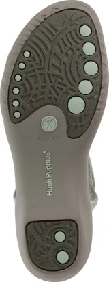 Sandalias Hush Puppies color gris con detalles en verde agua, con suela liviana y flexible.