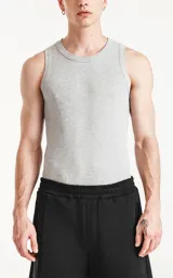 Musculosa básica unisex color gris melange, confeccionada en tela morley con moldería slim-fit.